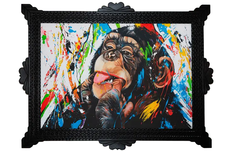 Tableau pop art d’un chimpanzé entouré d’éclaboussures de couleurs, cadre baroque noir
